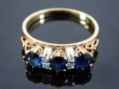 A 14ct gold sapphire & diamond ring