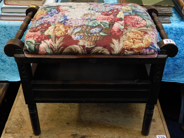 An adjustable Edwardian mahogany music stool