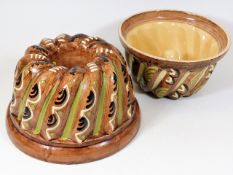 Two large earthenware jelly moulds