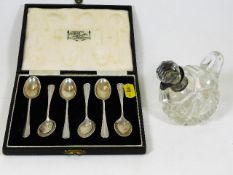 A boxed set of six silver spoons & a small cut gla