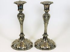 A pair of 19thC. silver plated candlesticks