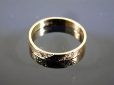 A small 9ct gold ring set with diamonds