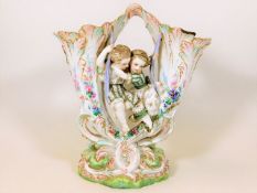 A 19thC. Paris porcelain figure group, damage to t