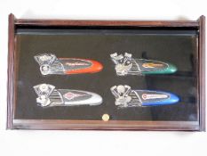 Four Harley Davidson pocket knives in display case
