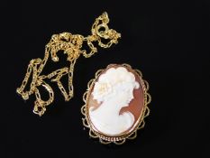 A 9ct cameo twinned with 9ct gold chain a/f