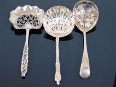 Three silver sifting spoons