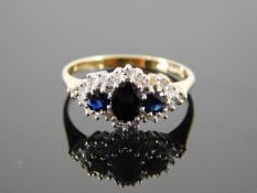 A 9ct gold sapphire & diamond ring