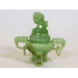 A mid 20thC. Chinese carved jade pot with cover