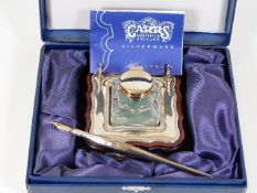 A boxed silver inkwell & pen set