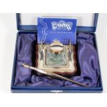 A boxed silver inkwell & pen set