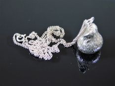 A silver necklace & pear pendant