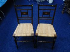 A pair of inlaid Edwardian cane bedroom chairs