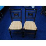 A pair of inlaid Edwardian cane bedroom chairs