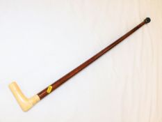 A malacca walking cane with ivory handle