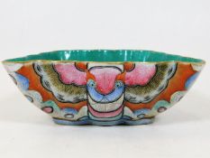 A Chinese Xianfeng porcelain bowl of moth shaped form & pol