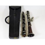 An early 20thC. Hawkes & Son rosewood clarinet