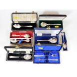 A quantity of boxed silver spoons & similar items