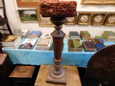 A 19thC. walnut pedestal