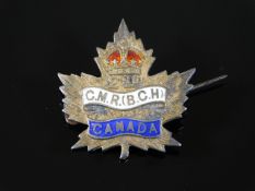 A silver & enamelled 2nd CMR, BCH Collar Badge
