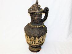 A large German majolica style ewer, chipped to bas