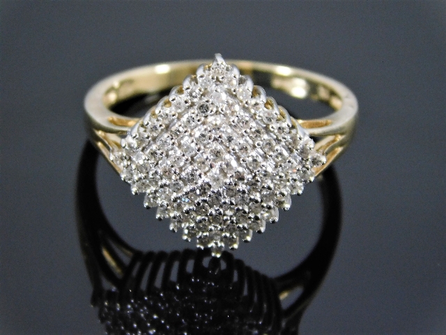 An 9ct gold diamond cluster ring