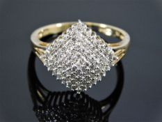 An 9ct gold diamond cluster ring