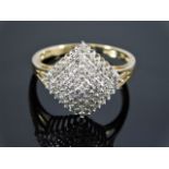 An 9ct gold diamond cluster ring