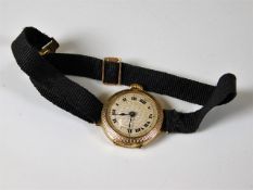 A ladies 9ct gold cased wrist watch