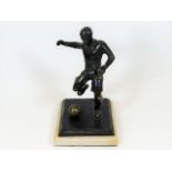 A mid 20thC. marble mounted bronze footballer