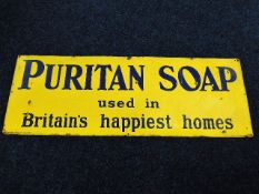 A large Puritan Soap enamel sign