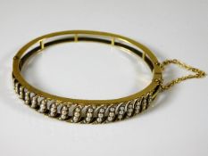 A 15ct gold & natural pearl bracelet