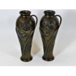 A pair of French bronze art nouveau vases