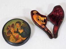 A lacquerware snuff box twinned with a cased meers