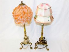 Two Edwardian brass Pullman lamps, one with origin