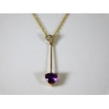 A necklace & pendant with diamond & amethyst