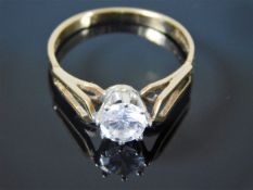 A 9ct gold ring set with cubic zirconia stone