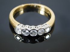 An 18ct gold diamond ring