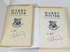 Two hand signed JK Rowling paperbacks