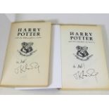 Two hand signed JK Rowling paperbacks