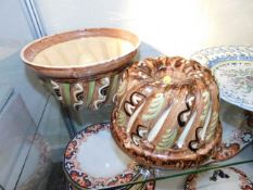 Two large earthenware jelly moulds