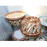 Two large earthenware jelly moulds