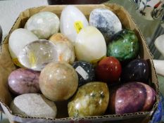 A quantity of fifteen polished stone eggs includin