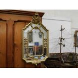 A gilt framed mirror & two others