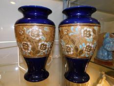 A pair of Royal Doulton stone vases