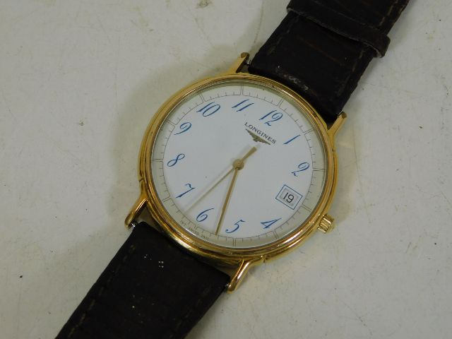 A gents Longines wrist watch