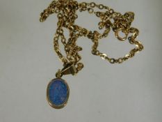 A 9ct gold chain with opal pendant