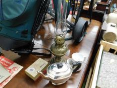 A silver plated teapot, an oil lamp & other items