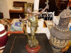 A French spelter model of a boy, signed to base
