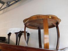 A small occasional table twinned with kidney shape