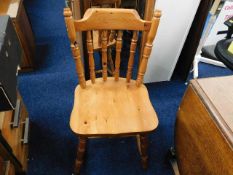 A modern pine farmhouse chair